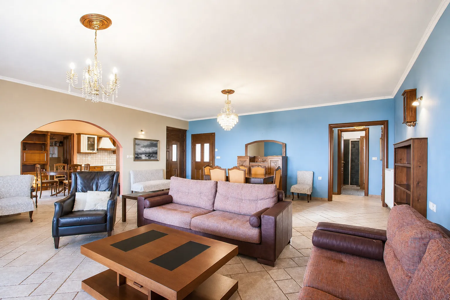 Open-plan lounge, dining and kitchen connected at Villa Viktoria, Skiathos